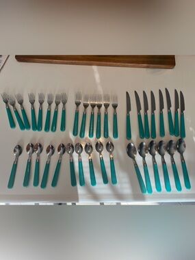 38 piece (Gibson?) Teal / Turquoise Stainless Flatware Cutlery Set